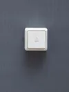 OKTAVA Выключатель 1-клавишный кнопочный для открытой установки 10А ВСк20-1-0-ОБ белый IEK5